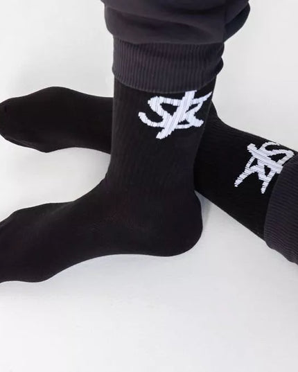 Sofa Killer juodos kojinės su baltu SK logotipu