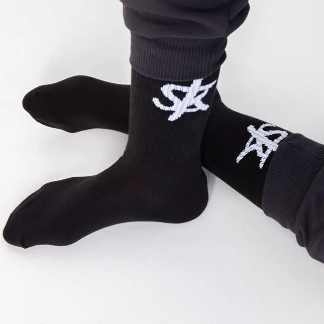 Sofa Killer juodos kojinės su baltu SK logotipu