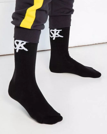 Sofa Killer juodos kojinės su baltu SK logotipu
